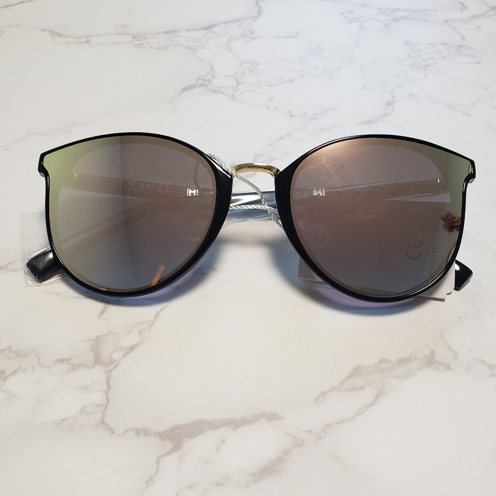 Women's Pink/Green Reflective Luxury sunglasses.